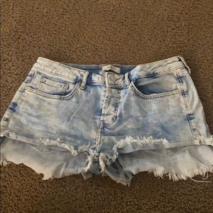 Blue and white faded shorts.